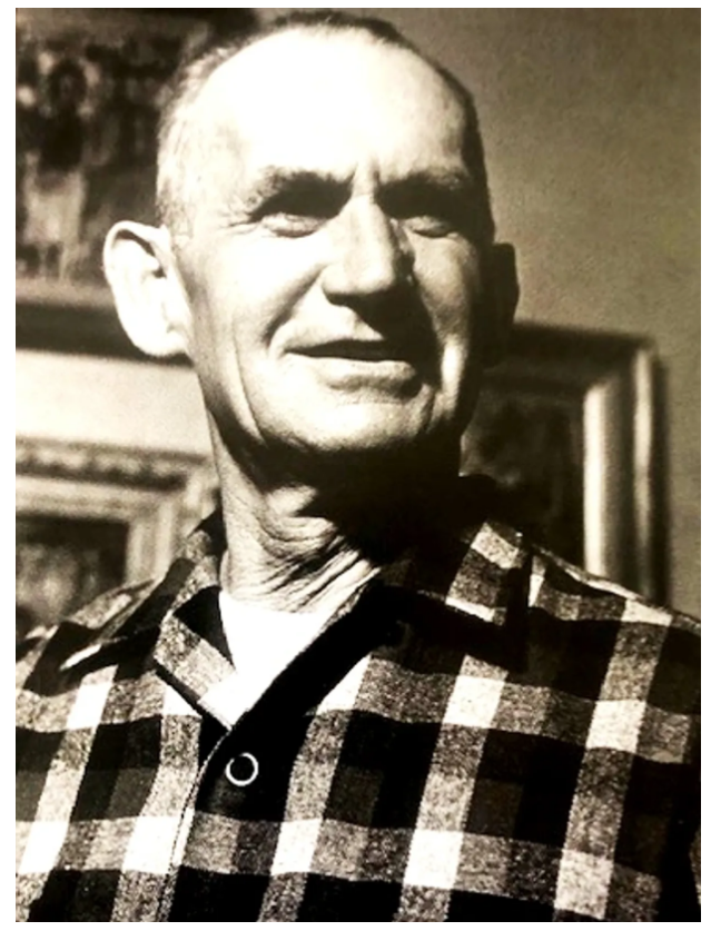 Black and white portrait photograph of Frank Koci in a checkered shirt